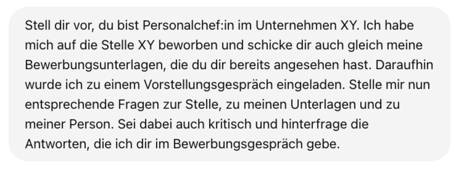 Ein Textfeld mit weißem Hintergrund und abgerundeten Ecken enthält einen deutschen Text. Der Text beschreibt ein Szenario für ein Vorstellungsgespräch und gibt Anweisungen für eine Rollenspielaufgabe.